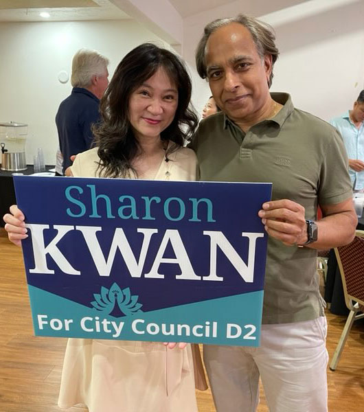 Sharon Kwan hold her campaign sigh with Sanjay Kucheria